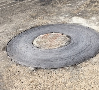Deforest manhole after repair
